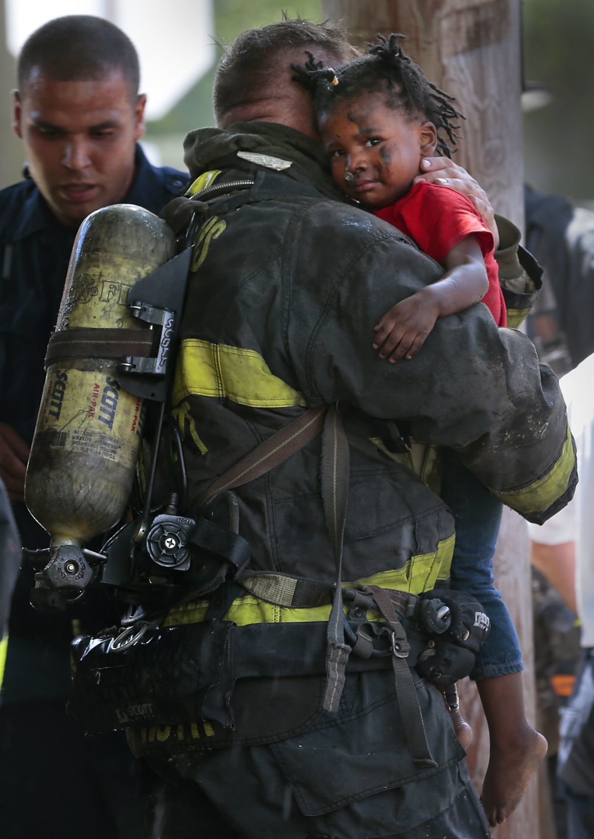 Firefighters rescue four children from burning apartment